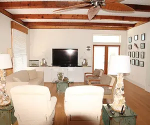 Photo 2 - Ocean front Vacation Home with a large screened-in Patio