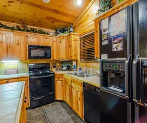 Photo 2 - Crooked Pine Cabin  Swing and Hot Tub on the Deck