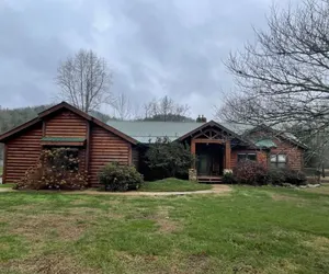 Photo 2 - Parkland, Deluxe Log Cabin, a Hot Tub and a Lake!