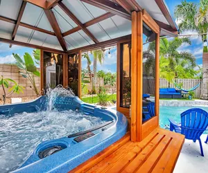 Photo 4 - Urban Oasis with Hot Tub, HEATED POOL and Private Movie Theater