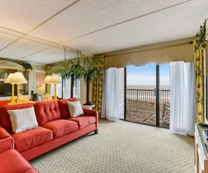 Photo 2 - Tastefully Decorated Condo with Scenic Beach Views