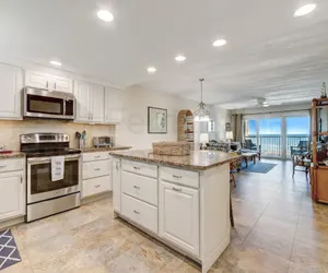 Photo 5 - Upper unit Overlooking the Beautiful Outdoor Space and Pier