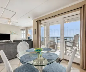 Photo 3 - Coast View Condo Featuring Large Windows Overlooking the Beach