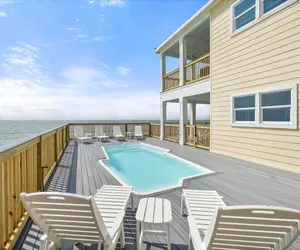 Photo 2 - Shamrock Shores - GULF FRONT west end PET FRIENDLY property with room for everyone.  3 Master suites!