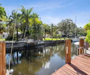 Photo 2 - Waterfront Property with  Pool. 10 Mins to Beach!