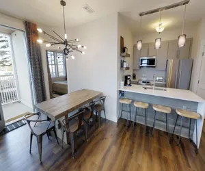 Photo 2 - Seneca #020 - Prime Location - enjoy the hot tub or outdoor fireplace - Underground heated parking provided!