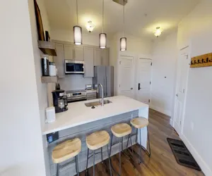 Photo 3 - Seneca #020 - Prime Location - enjoy the hot tub or outdoor fireplace - Underground heated parking provided!