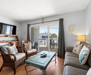 Photo 5 - Laid Back By The Sea - Steps from the beach with amazing ocean views.