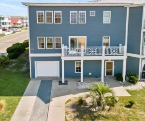 Photo 2 - Kure Beach Villa - Enjoy three levels of luxury! Outdoor pool and garage parking!