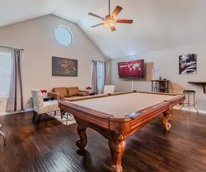 Photo 3 - Stunning, Modern, Spacious Getaway fits any group, 2 game rooms, Hot tub