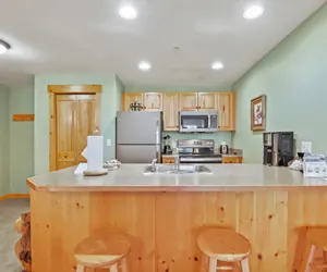 Photo 2 - Taylor&#39;s Crossing 2 Bedroom Condo #205