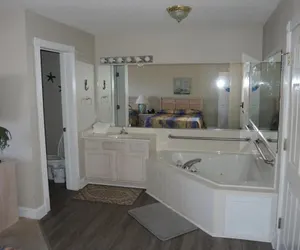 Photo 2 - Brunswick Plantation Studio Home 407L with Onsite Golf Course and Pools