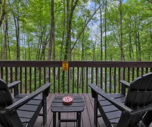 Photo 3 - Lakefront Cabin Bordering Nat Park w/ Hot Tub!