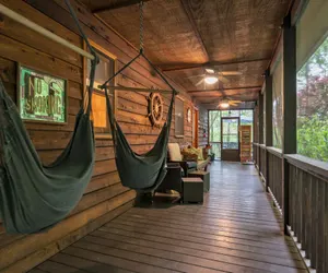 Photo 2 - Lakefront Cabin Bordering Nat Park w/ Hot Tub!