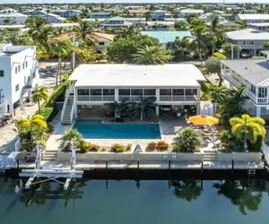 Photo 3 - Exceptional VENETIAN SHORES home with pool, dock and boat lift.