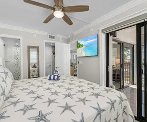 Photo 4 - Seaside 101: Oceanview 2BR/2BA Condo with Pool, Steps to Beach