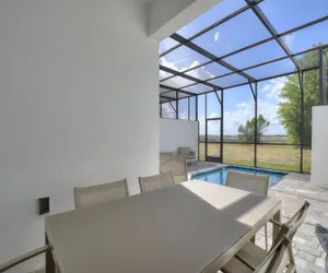 Photo 2 - Harmony Haven | Boutique Townhome at Azzure Resort Near Disney by Shine Villas