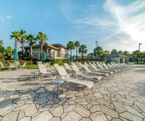 Photo 5 - Luxurious 6BR Villa in Champions Gate | Pool, Spa & Near Disney