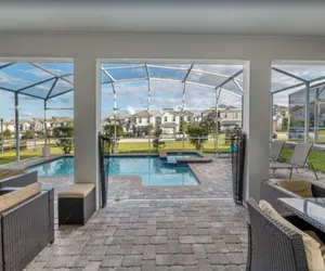 Photo 3 - 6BR Villa w/Pool in Champions Gate | Near Disney