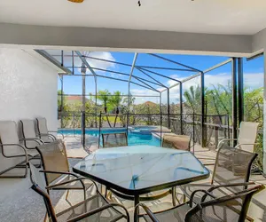 Photo 3 - Spacious 5BR Home w/ Private Pool+Spa in Scenic Davenport Location