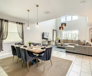 Photo 2 - Luxury 5BR Villa Near Disney | Pool & Golf Retreat