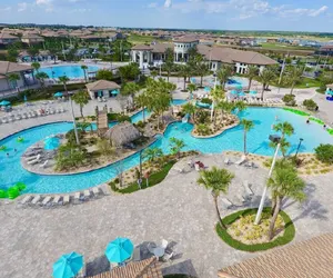 Photo 3 - Luxury 5BR Villa Near Disney | Pool & Golf Retreat
