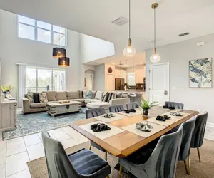 Photo 4 - Luxury 5BR Villa Near Disney | Pool & Golf Retreat