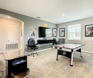 Photo 5 - Luxury 5BR Villa Near Disney | Pool & Golf Retreat
