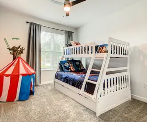 Photo 3 - Luxury 5BR Villa Near Disney | Pool & Golf Retreat