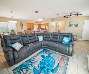Photo 2 - Charming Coastal Retreat Steps From Beach