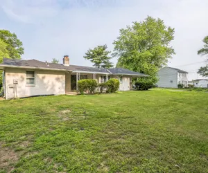Photo 5 - 4BR Retreat w/ Game Room, Patio, Golf Course View