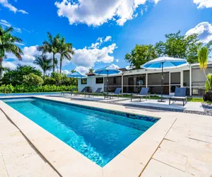 Photo 2 - 4BR Biscayne River Home with Pool & Pickleball Fun