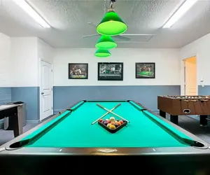 Photo 4 - Luxury 5BR Waterfront Retreat w/ Pool, Hot Tub & Game Room Near Disney
