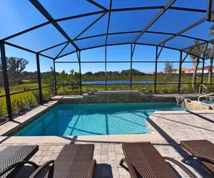 Photo 2 - Spacious 5-Bedroom Resort Pool Home with Lake View
