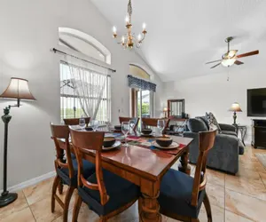 Photo 5 - Cozy 4BR Pool Home w/ Game Room Near Disney