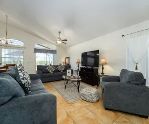 Photo 4 - Cozy 4BR Pool Home w/ Game Room Near Disney