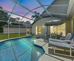 Photo 2 - Reserve Retreat - Gated 4BR with Pool Near Disney