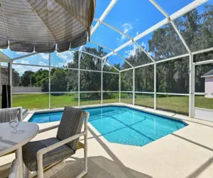 Photo 3 - Reserve Retreat - Gated 4BR with Pool Near Disney