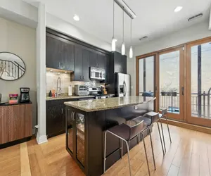 Photo 2 - Spacious 3-Bed West Loop Townhouse, 1 Car Garage