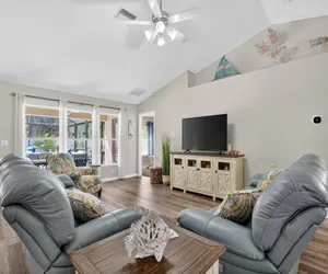 Photo 3 - Spacious 4BR Retreat with Heated Pool & Spa