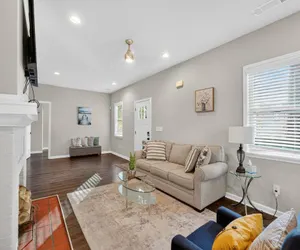 Photo 3 - Spacious 4BR Mozley Park Home with Fenced Yard