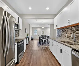 Photo 4 - Spacious 4BR Mozley Park Home with Fenced Yard