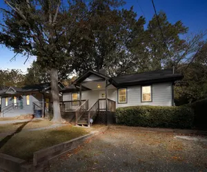 Photo 2 - Spacious 4BR Mozley Park Home with Fenced Yard