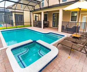 Photo 4 - Championsgate Resort 8 Bedroom Pool Home with Spa
