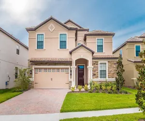 Photo 3 - Championsgate Resort 8 Bedroom Pool Home with Spa