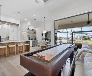 Photo 5 - Sandpiper Sanctuary -Waterfront Luxury with Private Pool, Spa & Dock