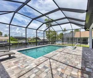 Photo 2 - Port Charlotte Private Pool and Dock Vacation Home - Canal access to Charlotte Harbor!