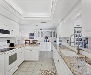 Photo 5 - Harbor Heights Private Pool Vacation Home on Canal with BBQ and Dock