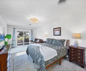 Photo 2 - Harbor Heights Private Pool Vacation Home on Canal with BBQ and Dock