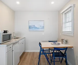 Photo 2 - Cozy Oceanfront Room | 2 Beds + Kitchenette